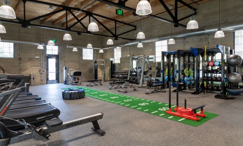 Large modern fitness center with crossfit style equipment