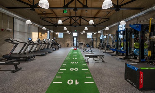 Large modern fitness center with running zone
