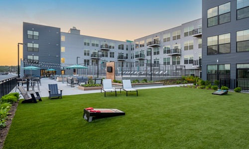 Outdoor Terrace Deck and Lounge Space with game lawn