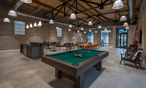 4,500 Sqft. Powerhouse Amenity Center with canned lighting throughout and billiards table